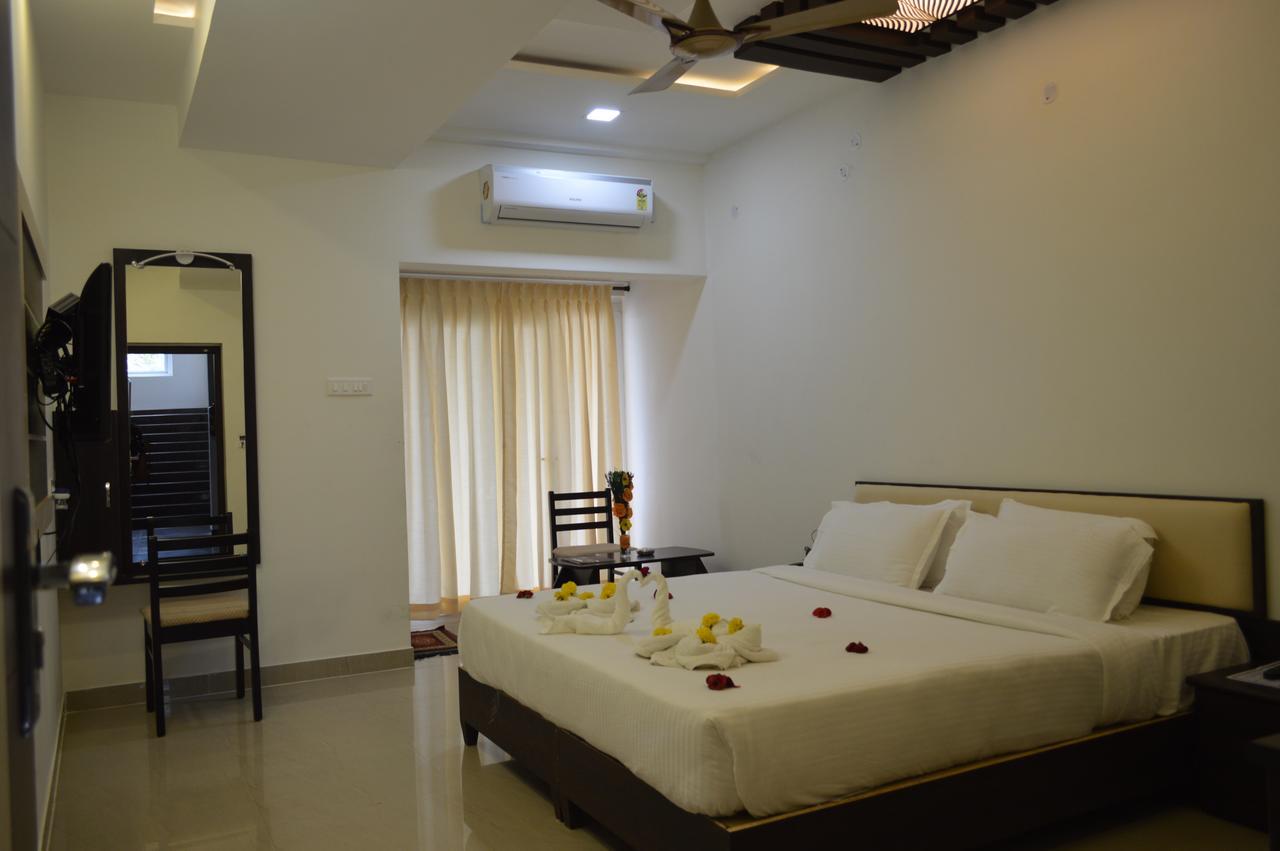 Ambāsamudram Hotel Ambai Grand מראה חיצוני תמונה
