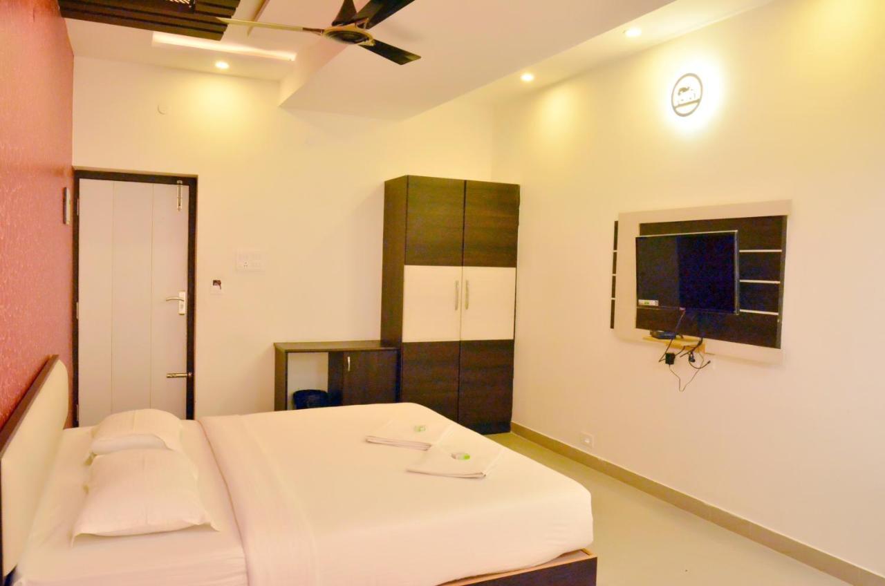 Ambāsamudram Hotel Ambai Grand מראה חיצוני תמונה