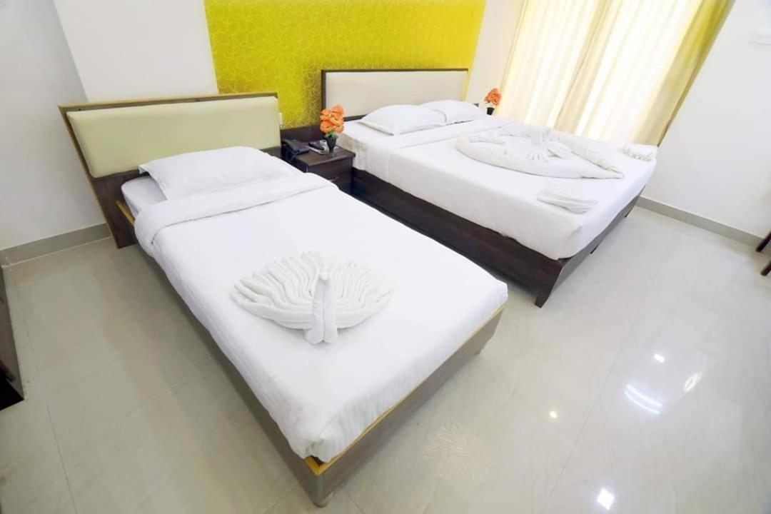 Ambāsamudram Hotel Ambai Grand מראה חיצוני תמונה