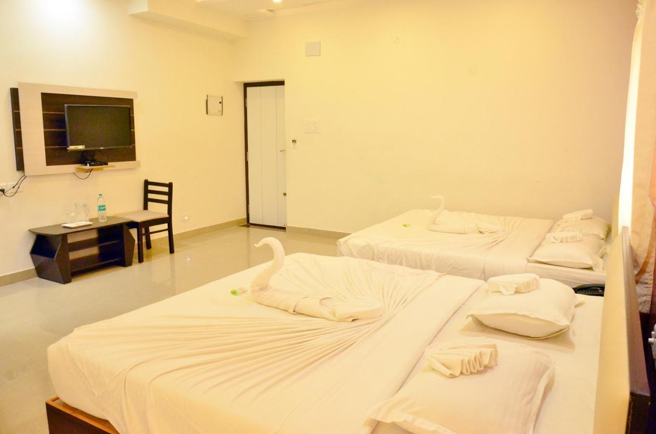 Ambāsamudram Hotel Ambai Grand מראה חיצוני תמונה